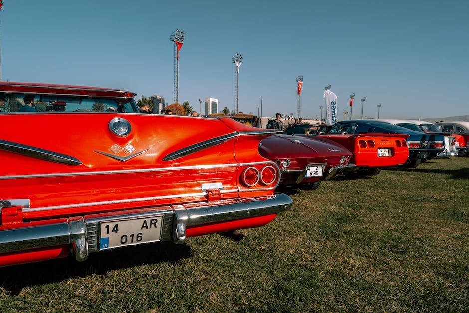 Image of classic cars lined up at a car show